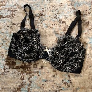 B.tempt’d black lace bra with white details